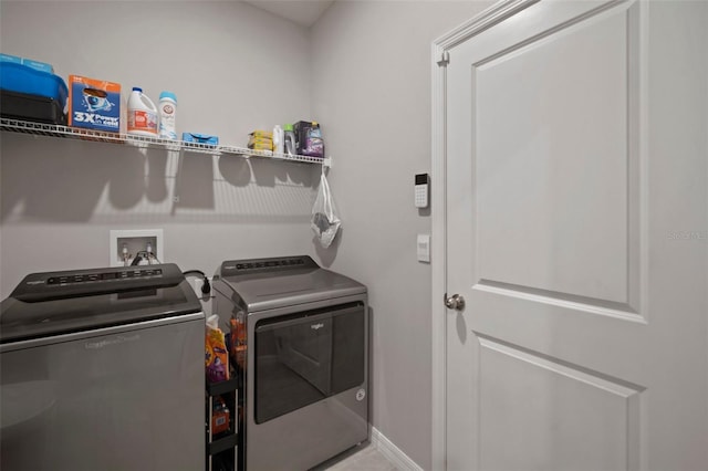 washroom featuring separate washer and dryer