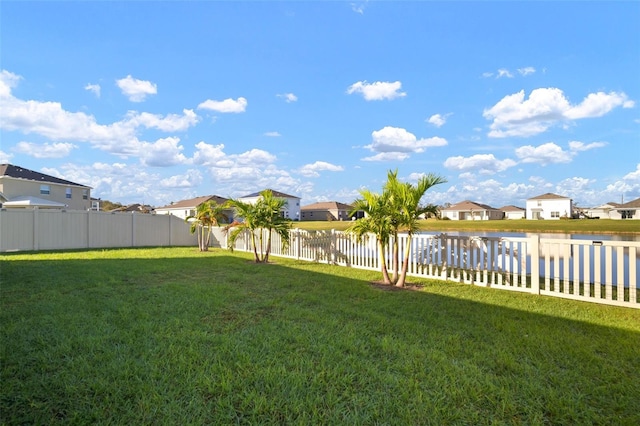 view of yard with a water view