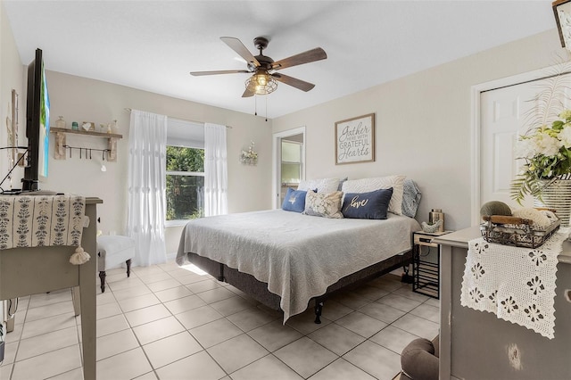 bedroom featuring light tile patterned floors and ceiling fan