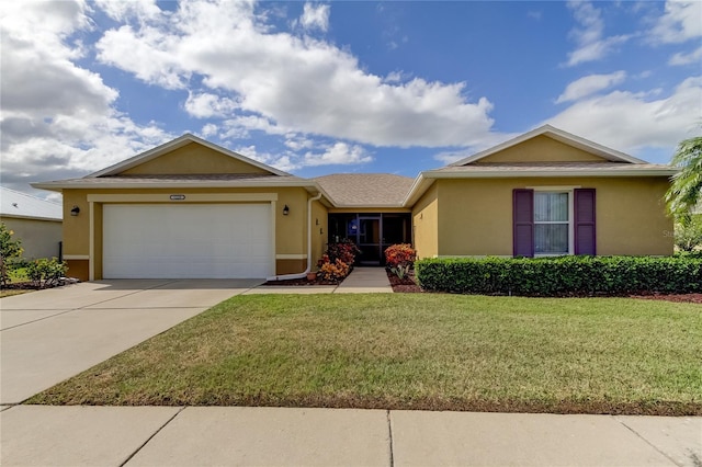 single story home with a garage and a front lawn