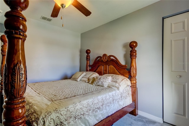 carpeted bedroom with ceiling fan