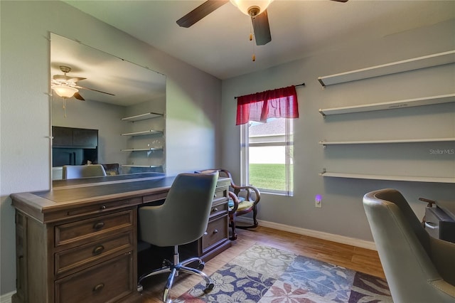 5220 Butterfly Shell Dr, Apollo Beach, FL 33572 - office area featuring a ceiling fan, wood finished floors, and baseboards