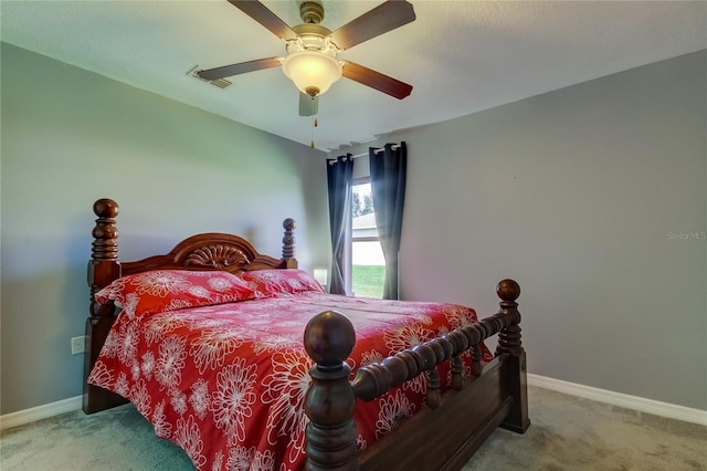 bedroom featuring ceiling fan and light colored carpet