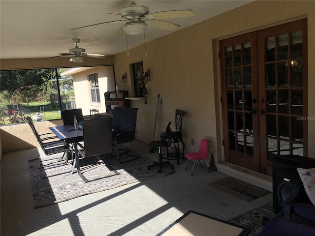 view of patio / terrace with ceiling fan and french doors