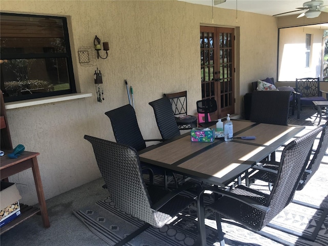 view of patio / terrace with ceiling fan and french doors