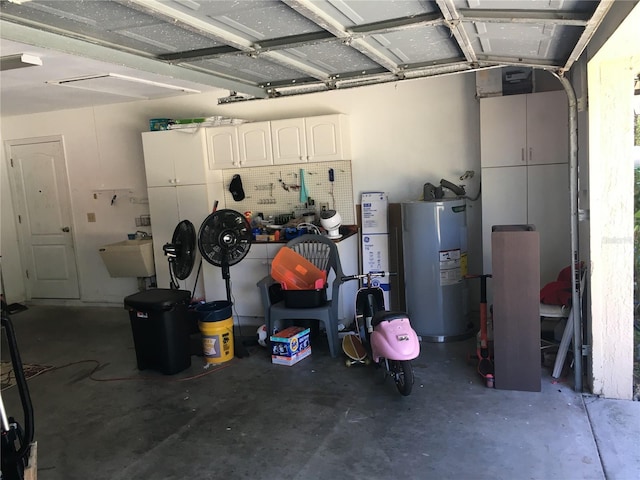 garage with sink and water heater