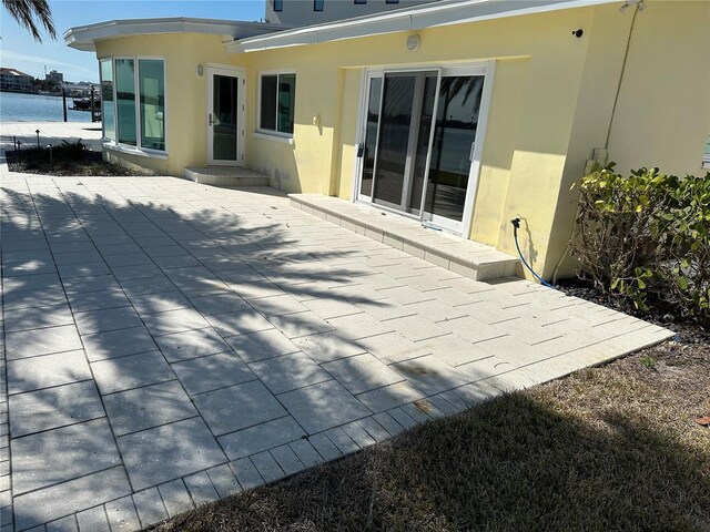 view of patio / terrace featuring a water view