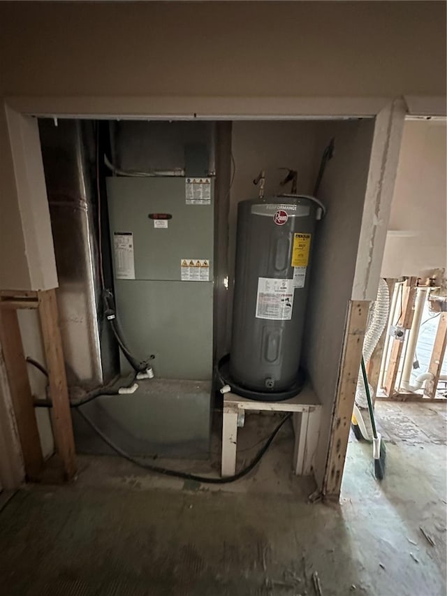 utility room with water heater