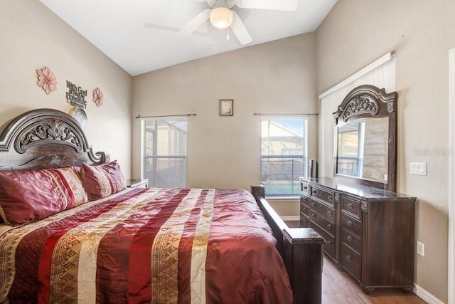 bedroom with lofted ceiling, light hardwood / wood-style flooring, and ceiling fan