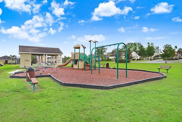 163 Andalusia Loop, Davenport, FL 33837 - community playground featuring a lawn