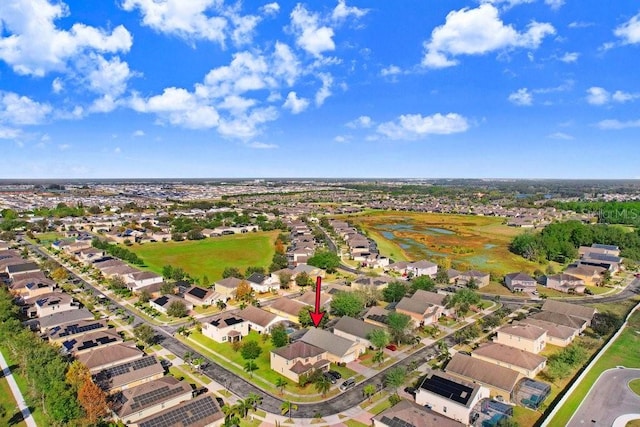 163 Andalusia Loop, Davenport, FL 33837 - aerial perspective of suburban area with a nearby body of water