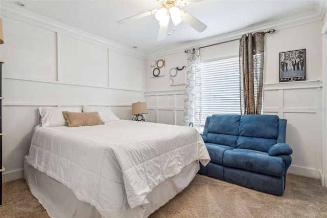 bedroom featuring ornamental molding, carpet flooring, and ceiling fan