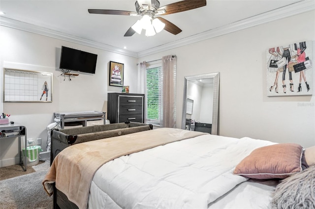 bedroom with ceiling fan, ornamental molding, and carpet floors