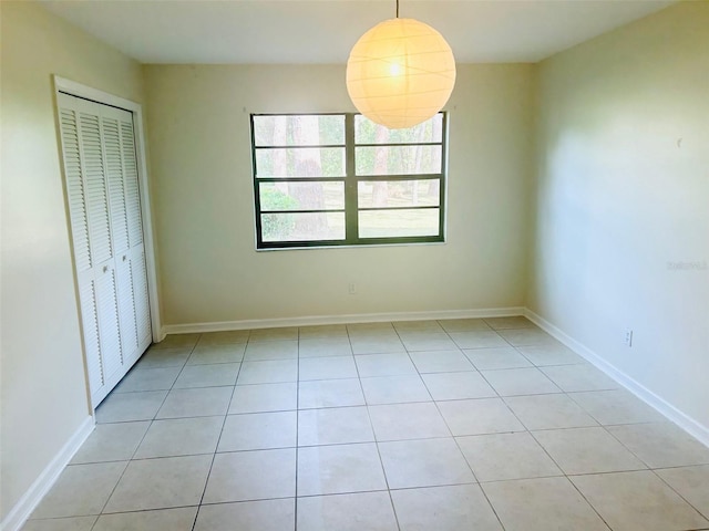 unfurnished dining area with light tile patterned floors