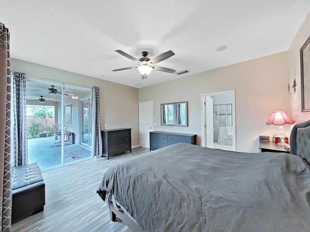 bedroom with access to outside, wood-type flooring, ceiling fan, and connected bathroom