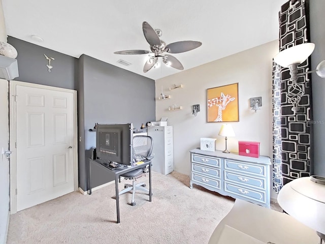 office area featuring light colored carpet and ceiling fan