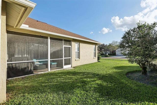 view of yard featuring a sunroom