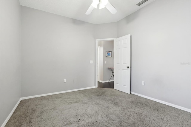 unfurnished bedroom with ceiling fan and carpet