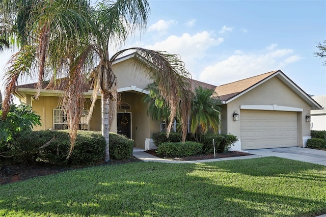 view of front facade featuring a front yard and a garage