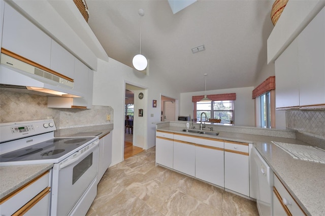 kitchen featuring white cabinets, decorative light fixtures, electric range, and vaulted ceiling