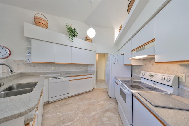 kitchen featuring white cabinetry, high vaulted ceiling, sink, decorative light fixtures, and white appliances