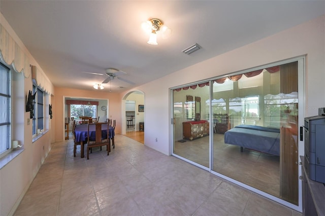 dining room featuring ceiling fan