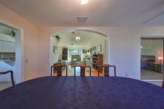 dining space featuring sink and hardwood / wood-style flooring