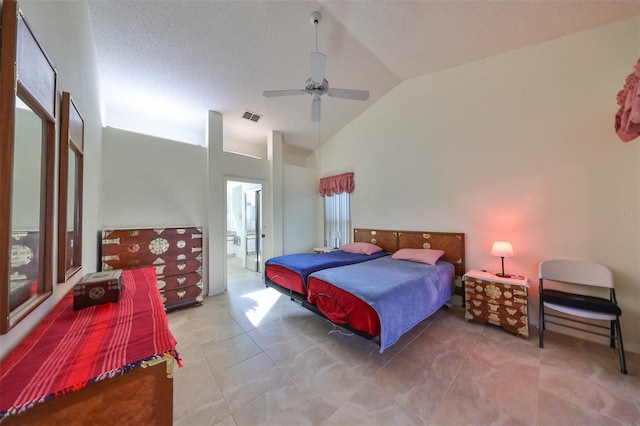 tiled bedroom featuring a textured ceiling, high vaulted ceiling, and ceiling fan