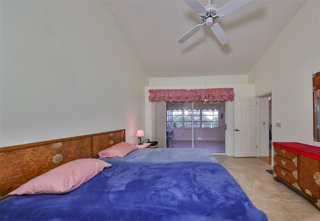 tiled bedroom featuring high vaulted ceiling and ceiling fan