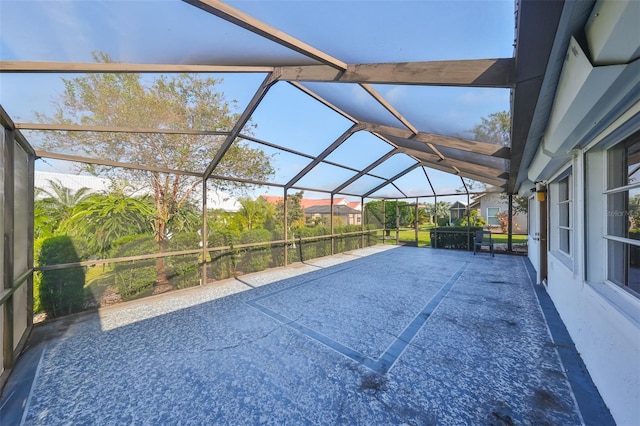 view of pool with a patio and a lanai