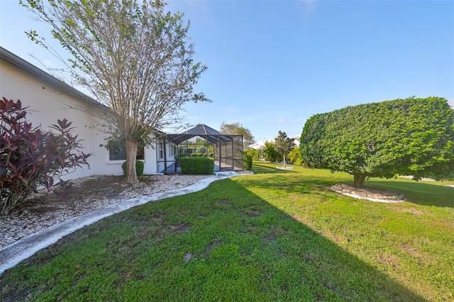 view of yard with a lanai