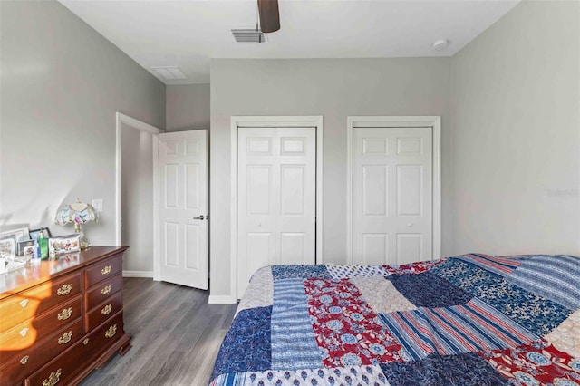 bedroom featuring ceiling fan and dark hardwood / wood-style floors