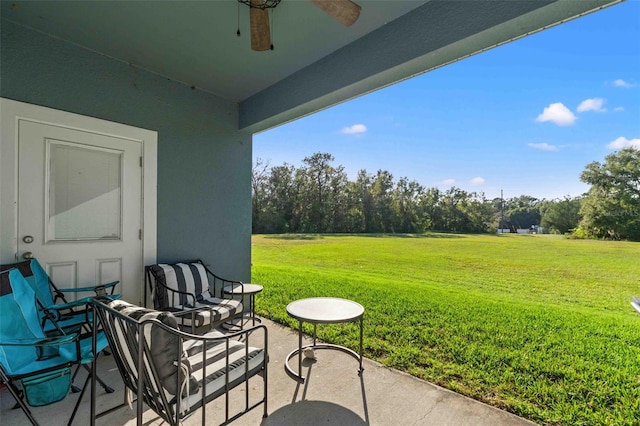 view of patio / terrace featuring ceiling fan