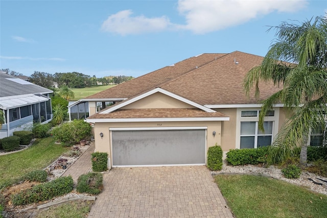 view of front of home with a garage