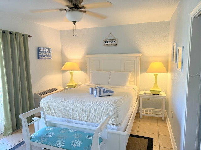 bedroom featuring ceiling fan and light tile patterned floors