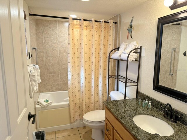 full bathroom featuring tile patterned flooring, vanity, shower / bath combination with curtain, and toilet