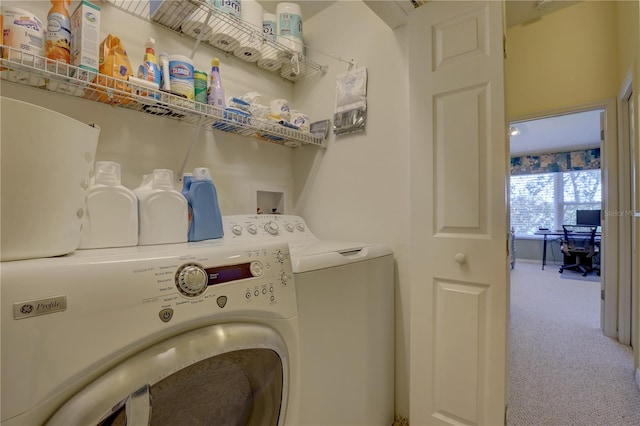 laundry area featuring carpet floors and washer and dryer