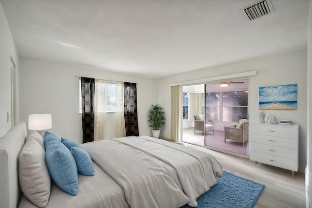 bedroom with light hardwood / wood-style flooring