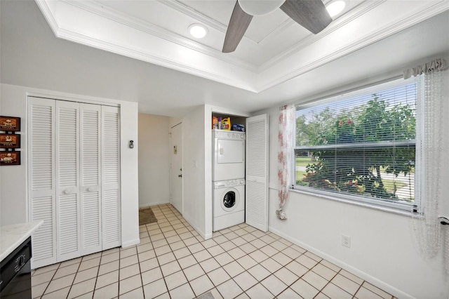 clothes washing area featuring ornamental molding, stacked washer / drying machine, light tile patterned floors, and ceiling fan