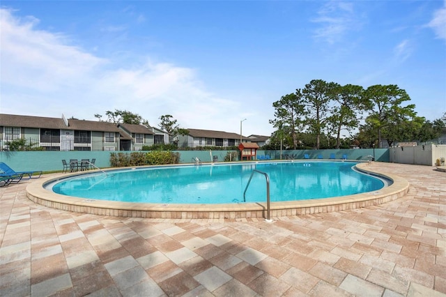 view of pool featuring a patio area