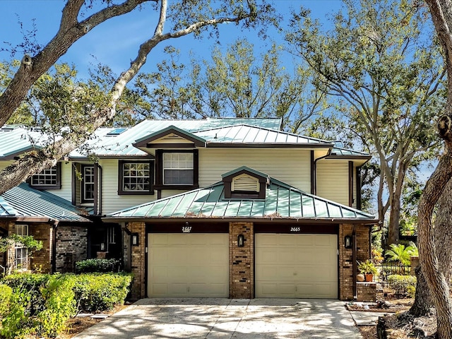 view of front of property with a garage