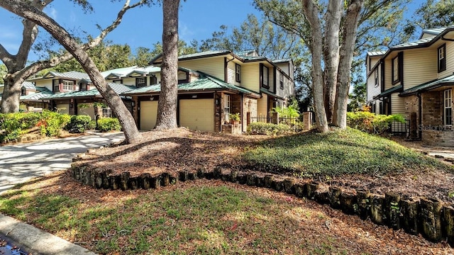 view of front of property featuring a garage