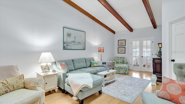 living room with french doors, vaulted ceiling with beams, and light hardwood / wood-style flooring