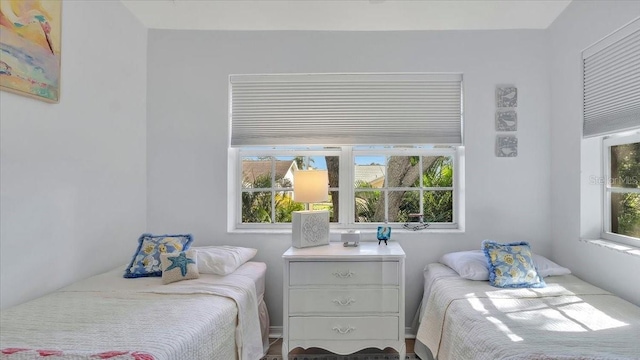 bedroom featuring multiple windows