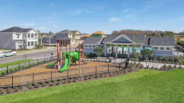 view of jungle gym featuring a yard