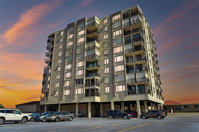 view of outdoor building at dusk