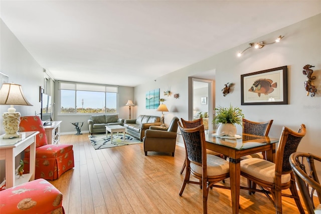 dining room with light hardwood / wood-style flooring