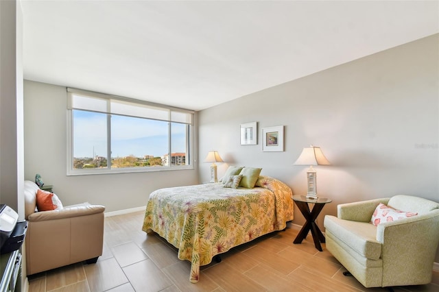 bedroom with light hardwood / wood-style floors