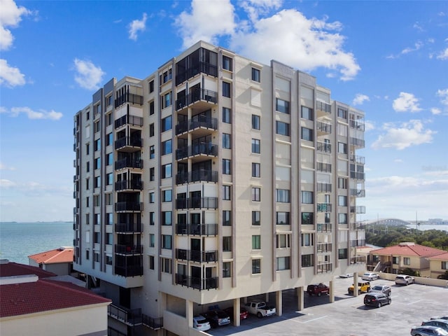 view of building exterior with a water view