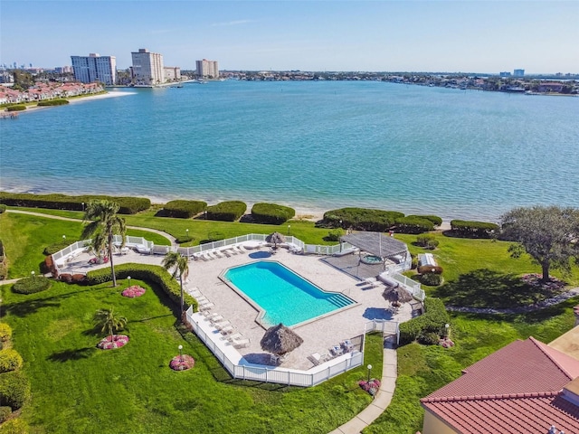 birds eye view of property featuring a water view